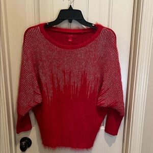 Jennifer Lopez Red Sweater with Silver Detailing